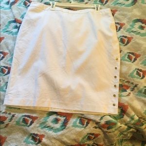 White pencil skirt with gold snap buttons